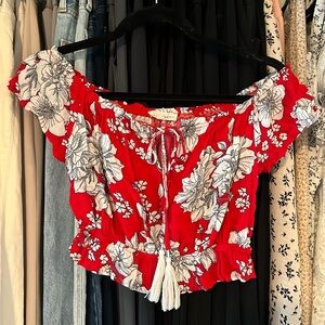 Red and white floral off the shoulder cropped cap sleeve shirt